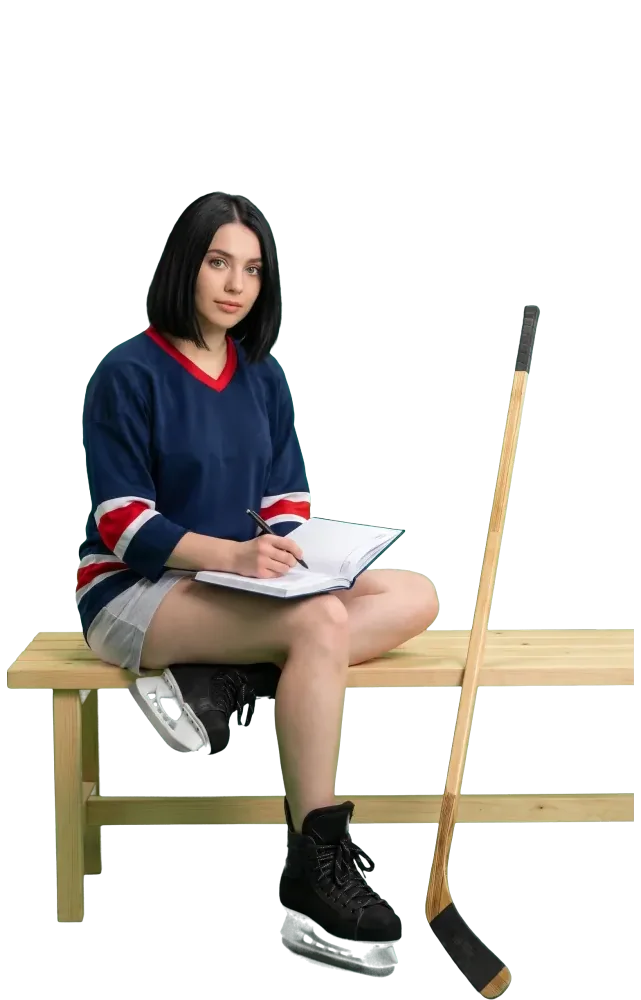 Woman on a bench writing in a notebook