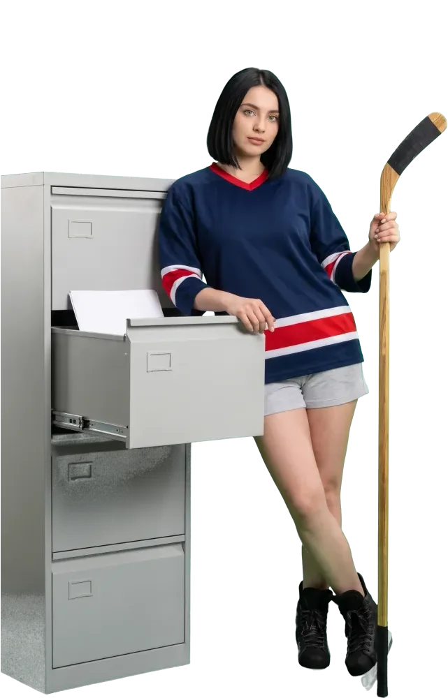 Woman leaning on a filing cabinet with an open drawer