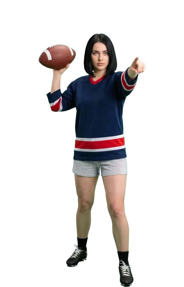 Woman about to throw a football and pointing ahead