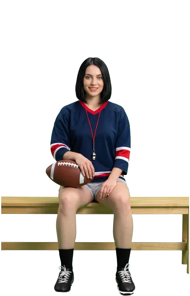 Woman on a bench with a football on her lap and a whistle around her neck