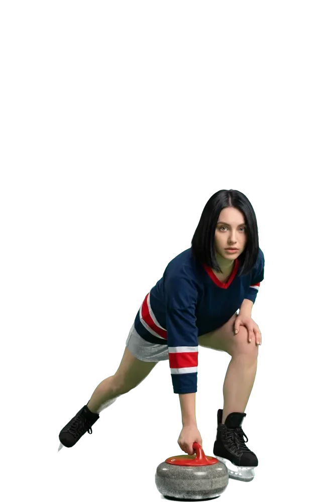 Woman in a curling delivery pose with a stone