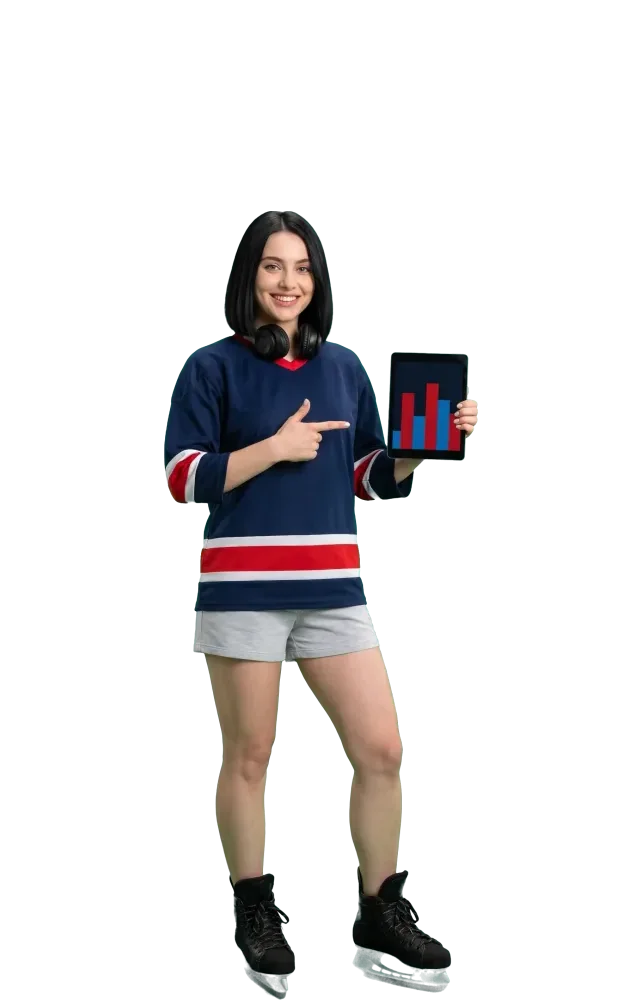 Woman with headphones around her neck pointing at a tablet