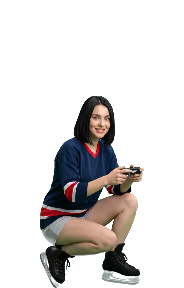 Woman crouching and playing with a game controller
