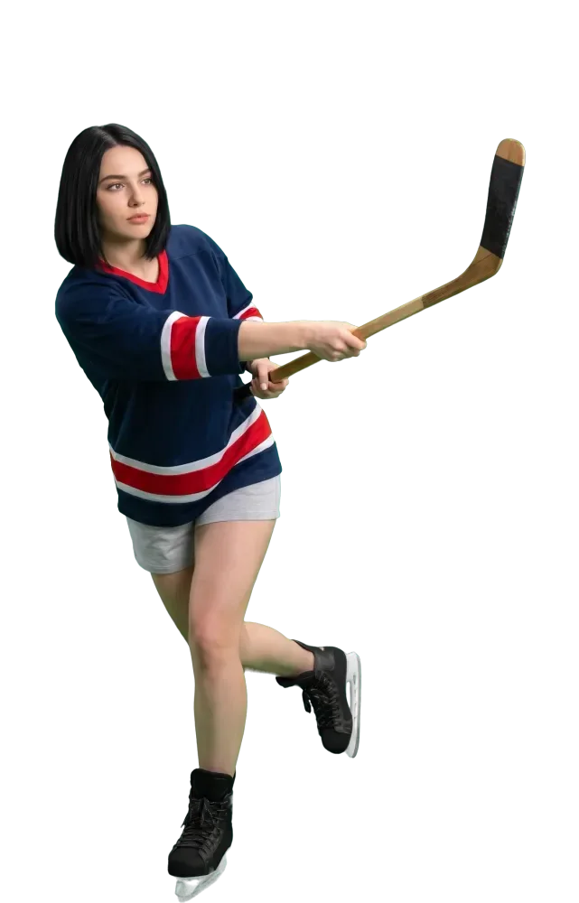 Woman in the follow-through of a wrist shot