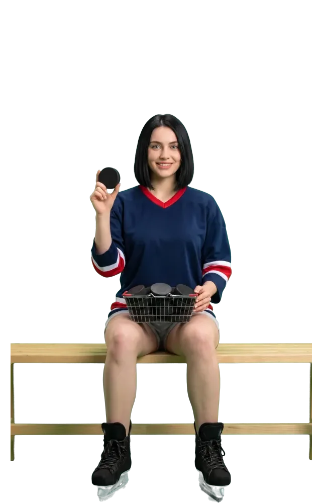 Woman on a bench with a basket full of pucks
